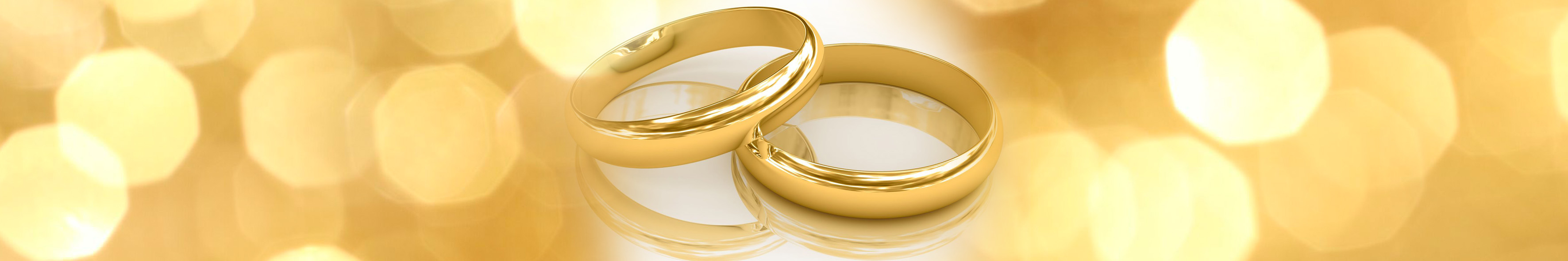 Wedding Rings on a golden background